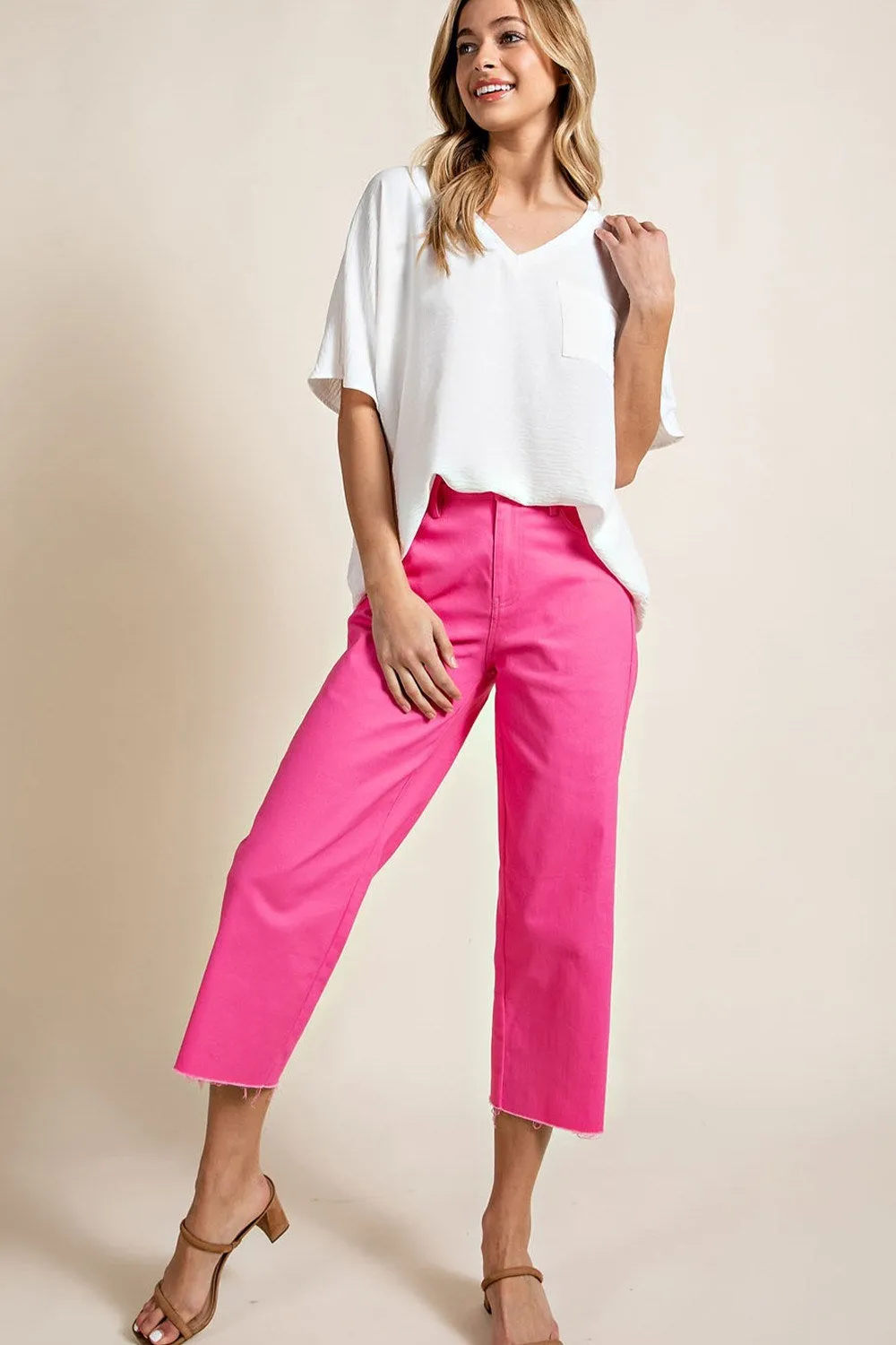 Woven top with V-neckline short sleeves and chest pocket